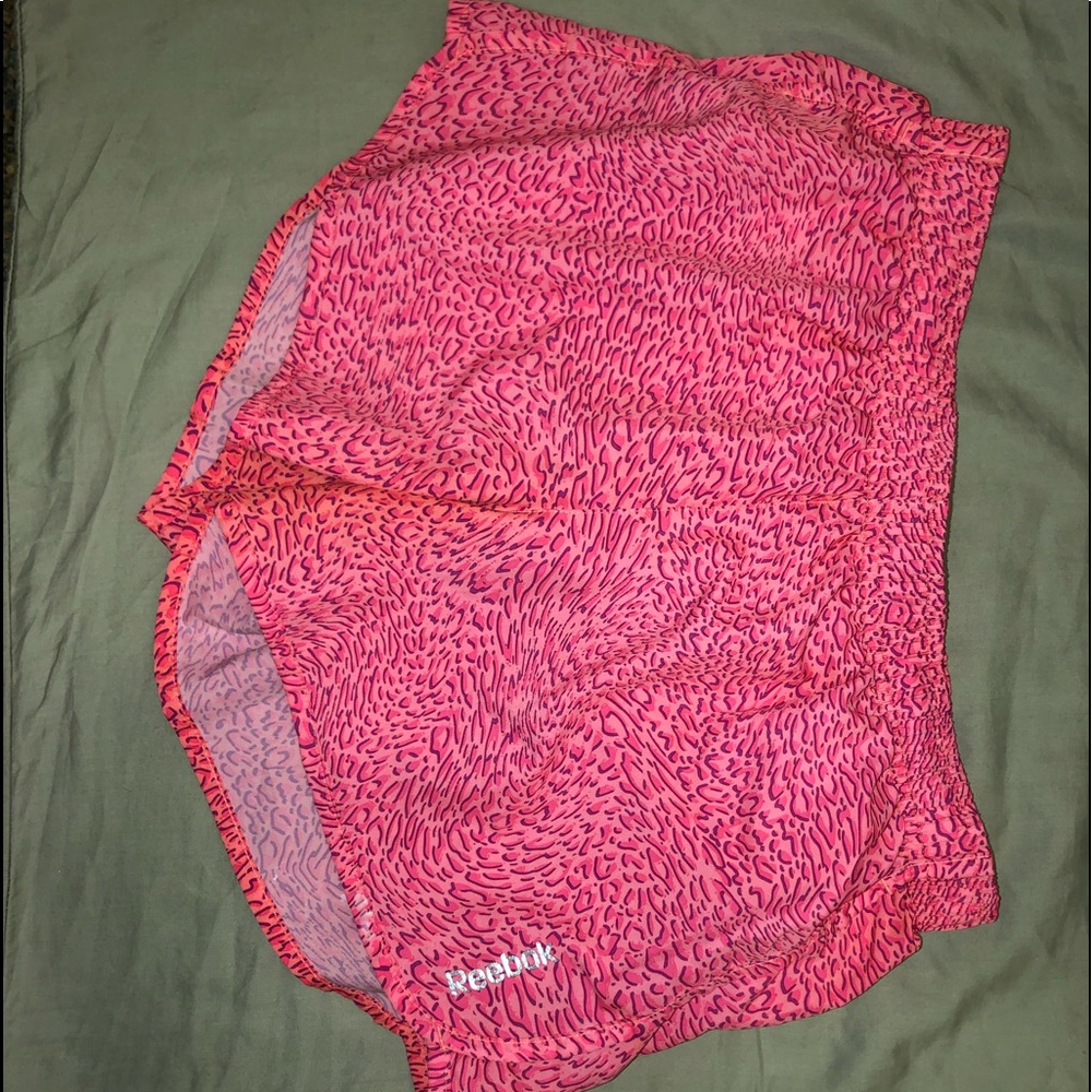 Bright pink patterned running shorts
